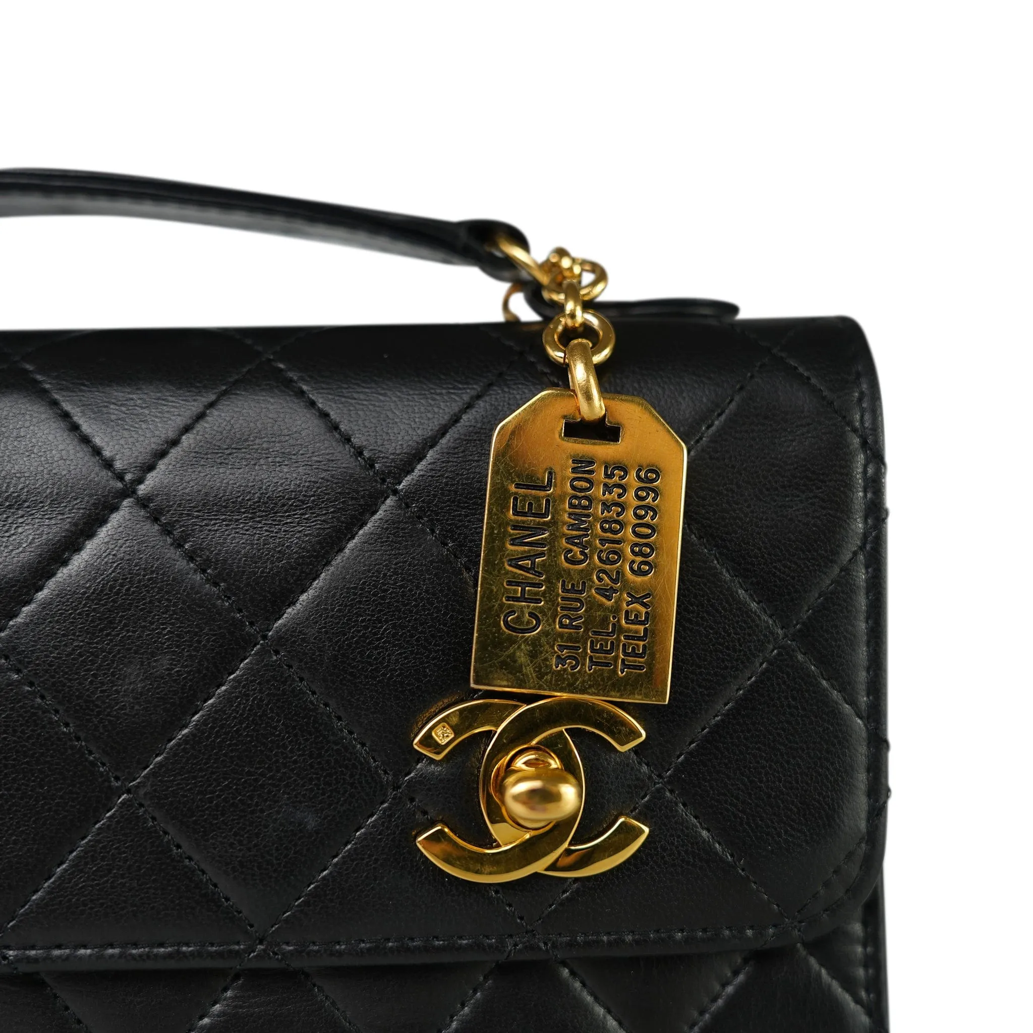 Black Lambskin Quilted Top Handle Double Turnlock Single Flap Gold Hardware