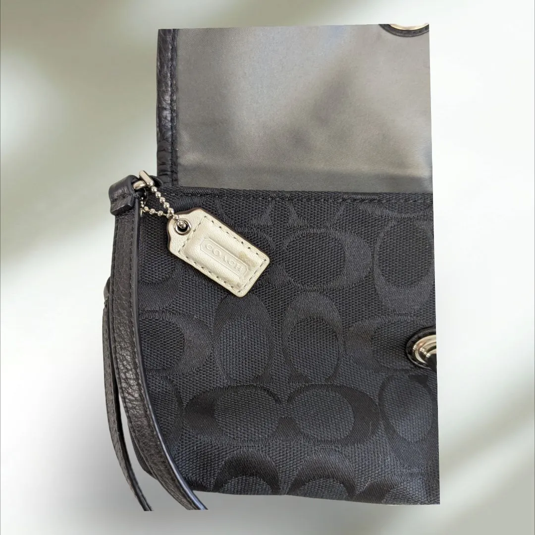 COACH Signature large flap Wristlet