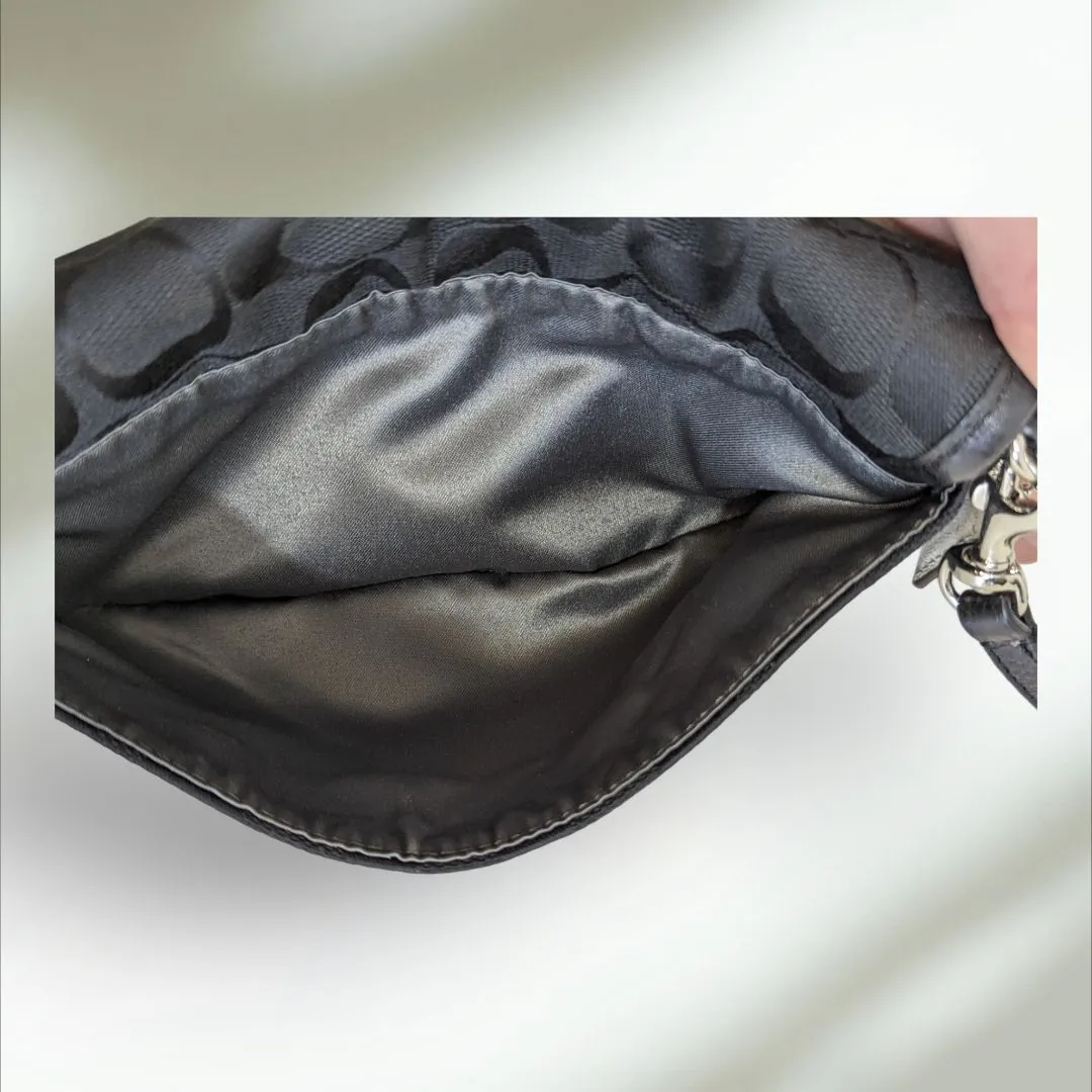 COACH Signature large flap Wristlet