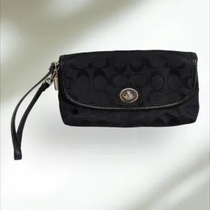 COACH Signature large flap Wristlet