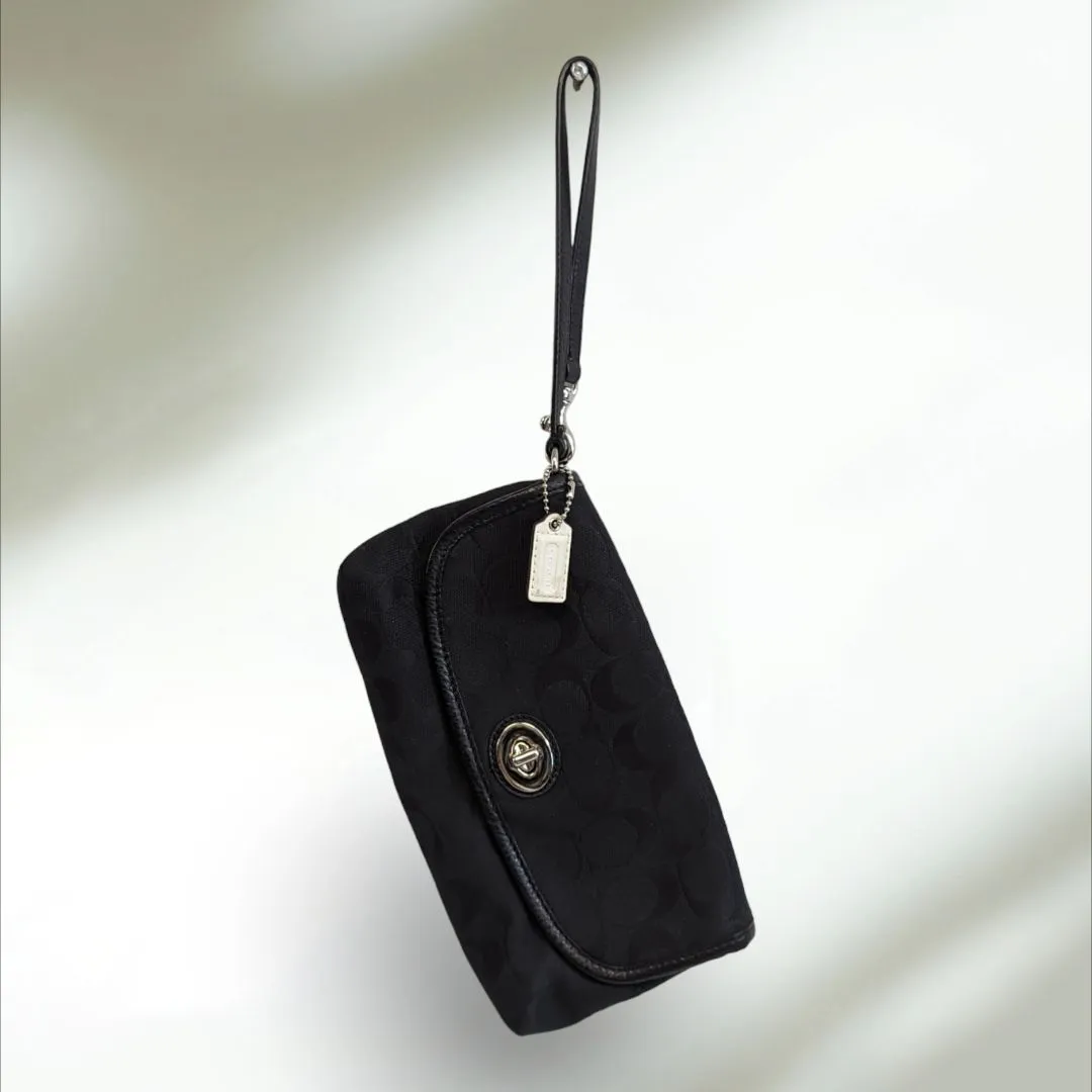 COACH Signature large flap Wristlet