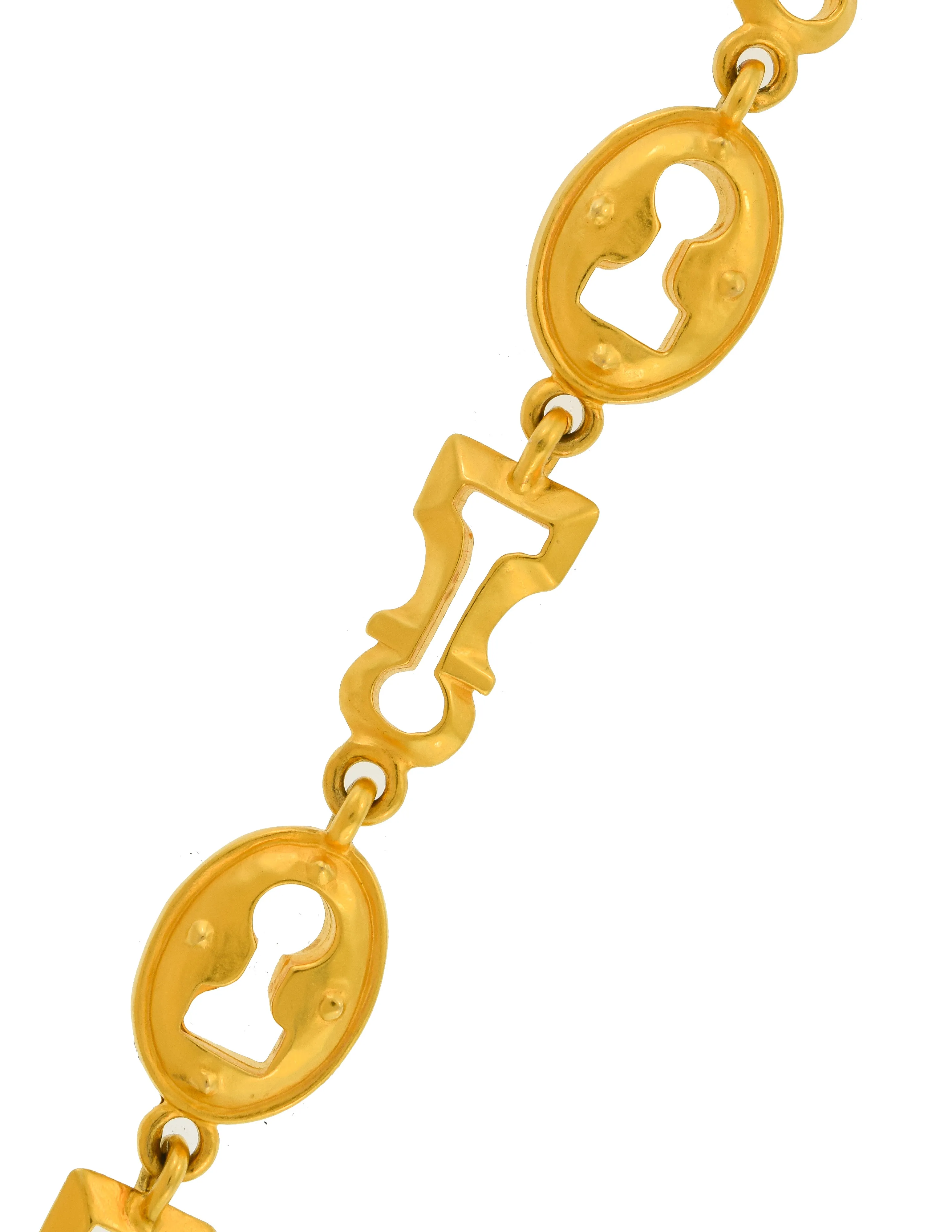 Karl Lagerfeld Vintage Brushed Gold Surrealist Keyhole Charm Link Bracelet