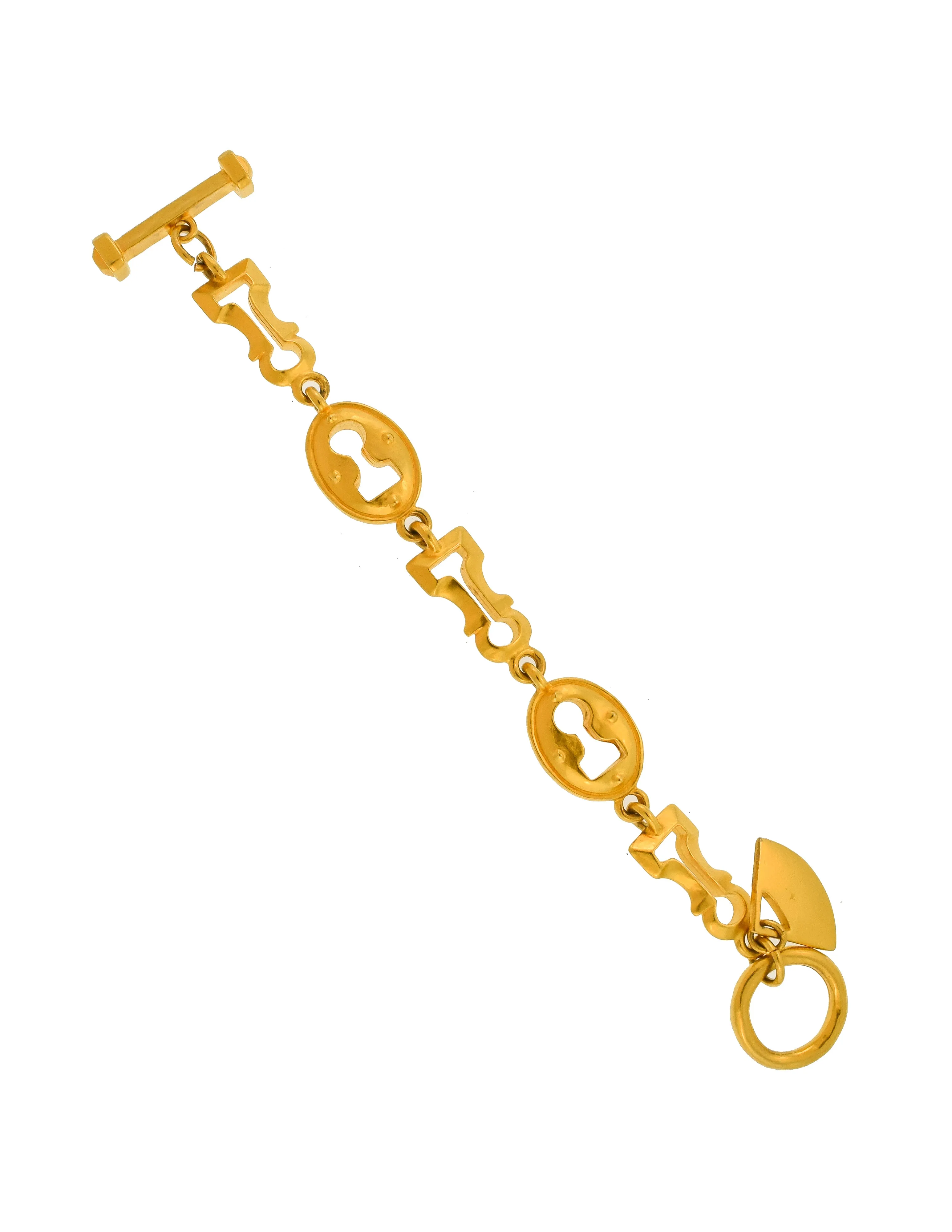 Karl Lagerfeld Vintage Brushed Gold Surrealist Keyhole Charm Link Bracelet