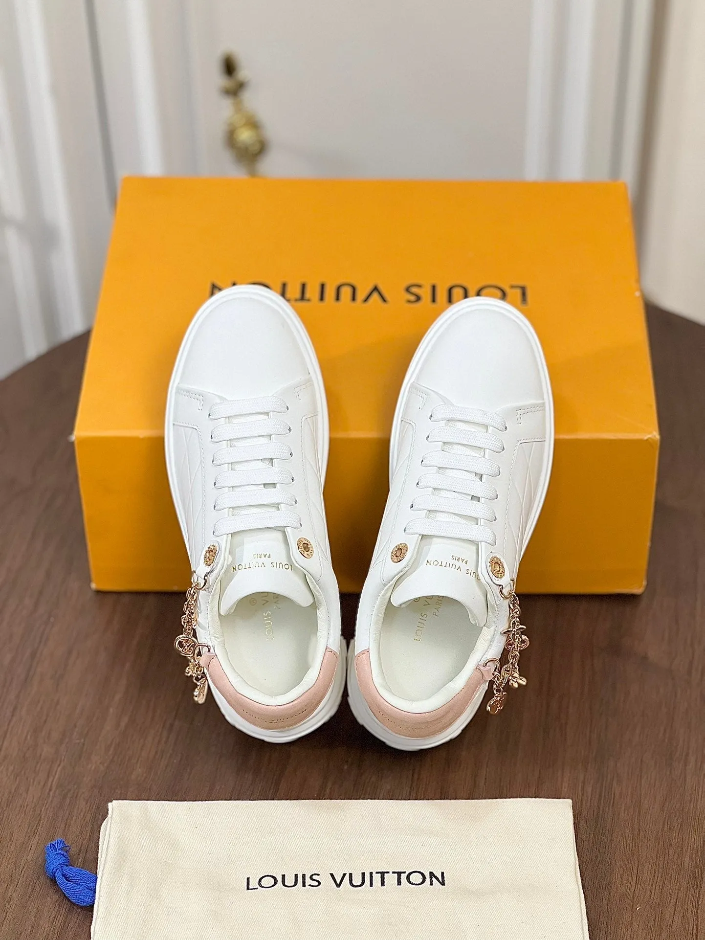 Louis Vuitton TIME OUT SNEAKER WHITE CALFSKIN WITH SIGNATURE CHARMS