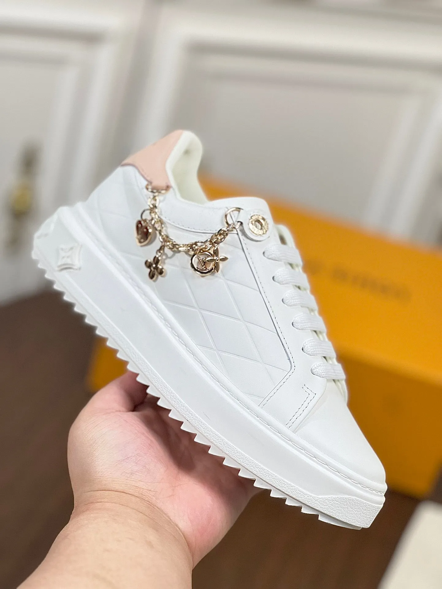 Louis Vuitton TIME OUT SNEAKER WHITE CALFSKIN WITH SIGNATURE CHARMS