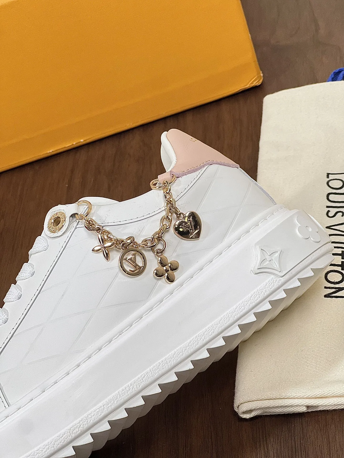Louis Vuitton TIME OUT SNEAKER WHITE CALFSKIN WITH SIGNATURE CHARMS